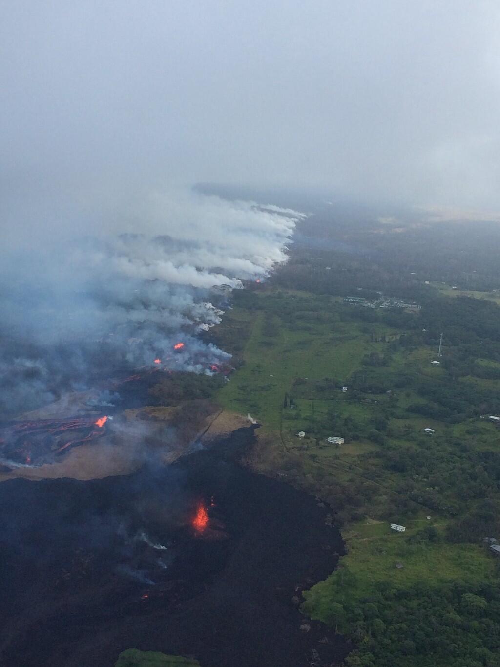 View of the fissure system in Leilani Estates looking southwest (up...