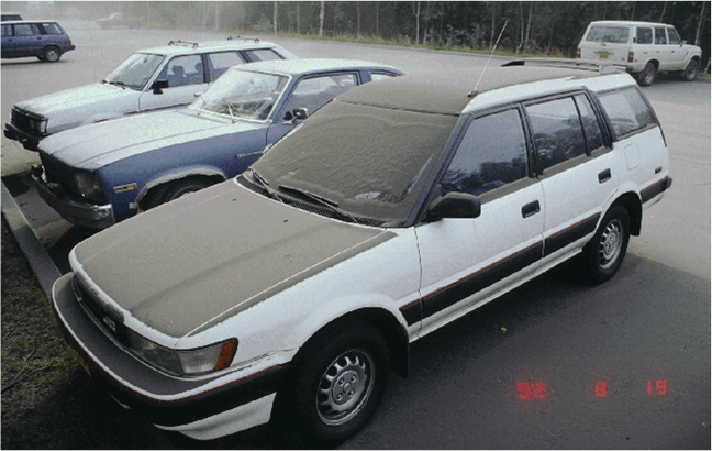 Minor ashfall on car hood from Mount Spurr, Anchorage, Alaska, 1992...