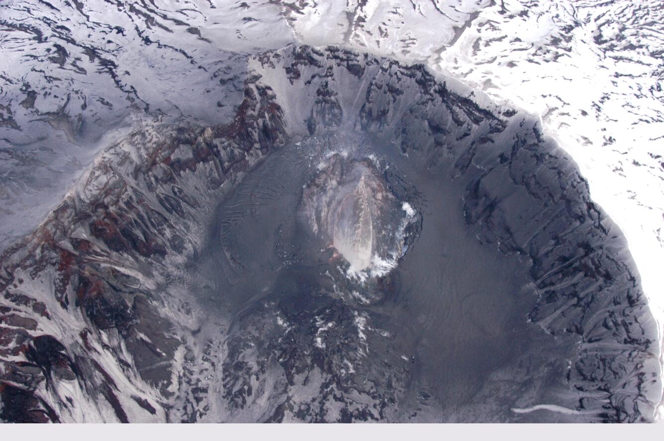 Vertical view, Mount St. Helens' crater and dome. North is to the b...