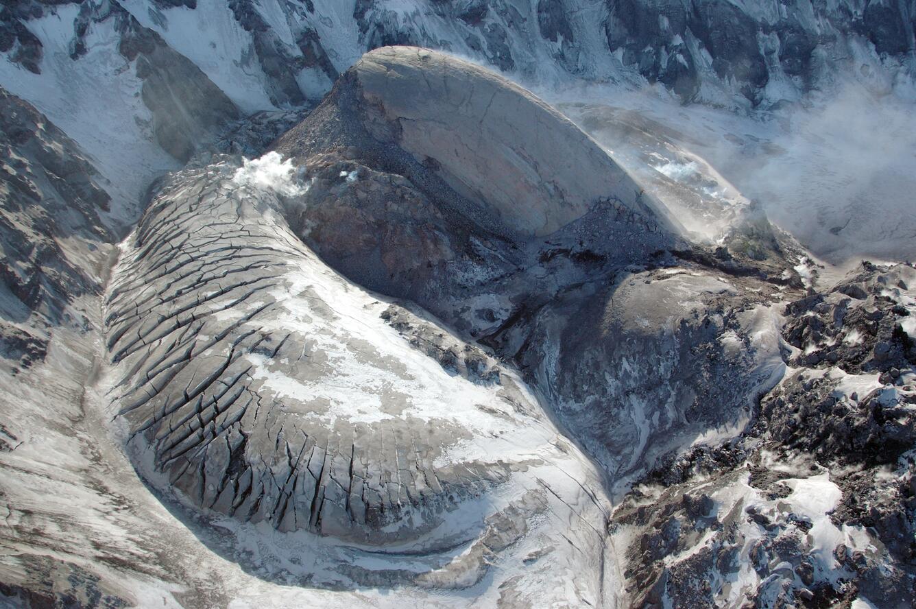 Crater Glacier (cracked surface in center left foreground) and whal...