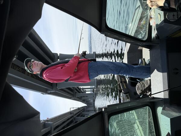 scientist on boat fishing