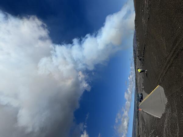 Color photograph of eruption plume