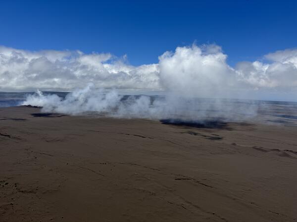 Color photograph of volcanic plume