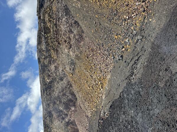 Color photograph of weather crater wall
