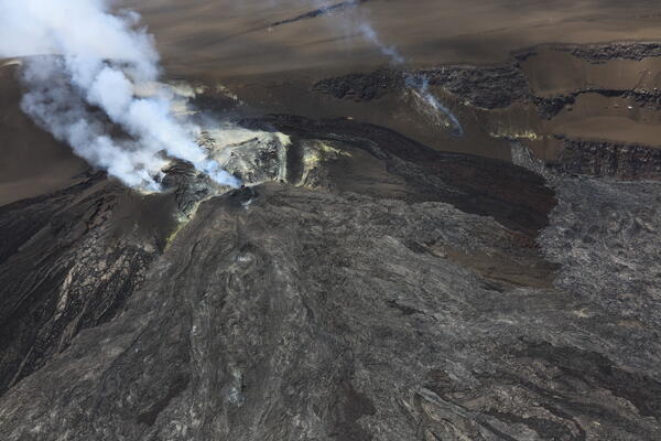 Color photograph of volcanic vents degassing