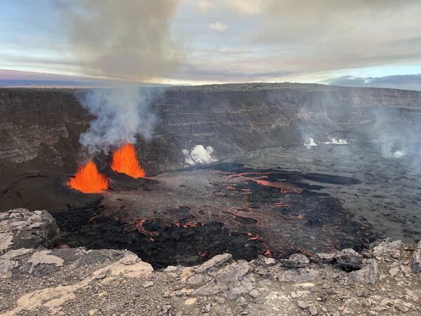 Color photograph of erupting vents and small lava flows
