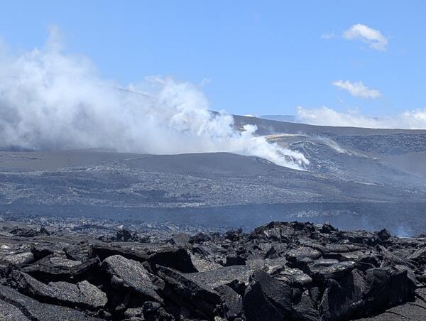 Color photograph of degassing volcanic vents