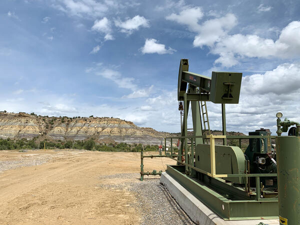 A pumpjack at an active drilling site near Farmington, NM