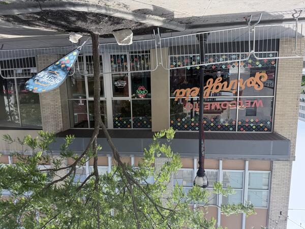 Exterior of a visitor center with “Springfield Route 66 Welcome Center” on a window