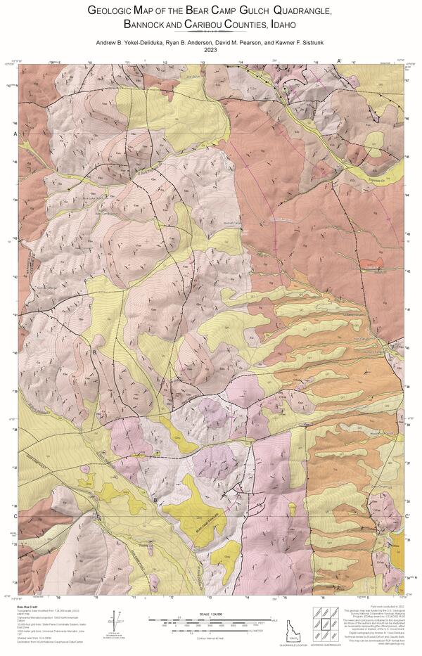 Geologic map in varying shades of pink, orange and yellow depicting different rock units in the Bear Camp Gulch Quadrangle; text at the bottom of map and index map for location within the state of Idaho. 