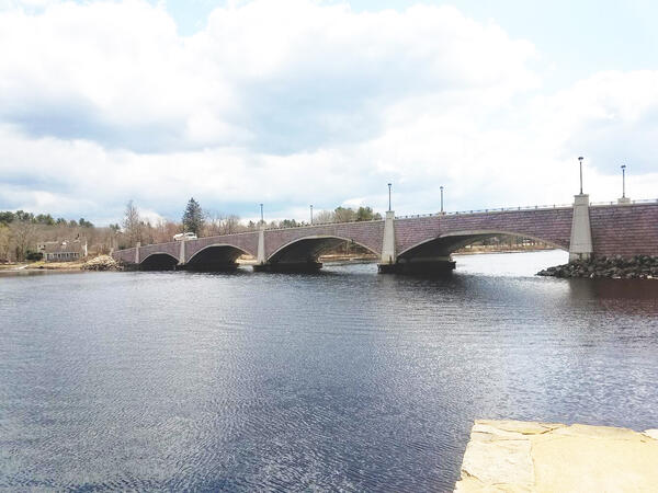 An arched bridge over a river