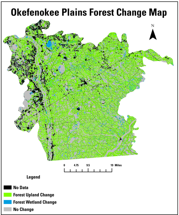 A map of an irregularly shaped area with mostly green background, black text labels and a legend