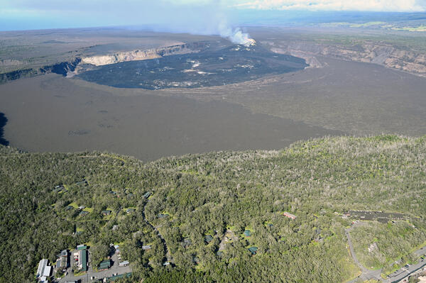 Color photograph of caldera at summit of volcano