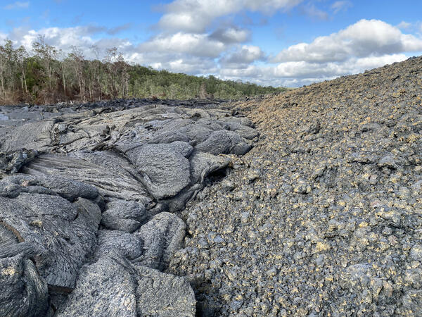 Color photograph of cooled lava flow margin