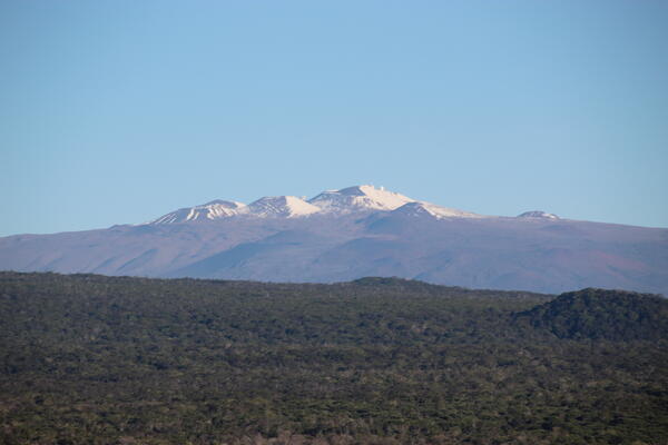Color photograph of mountain covered with snow