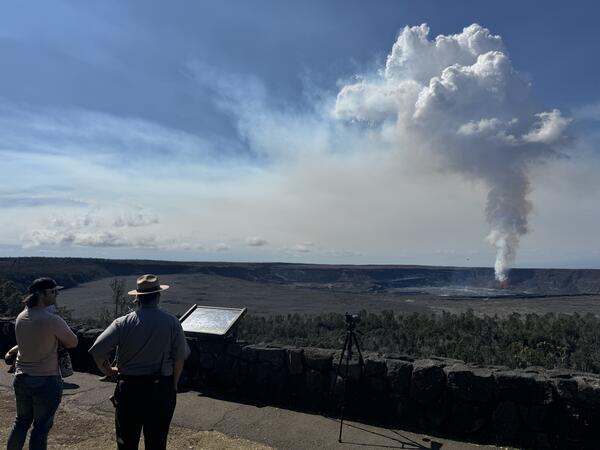 Color photograph of eruption plume