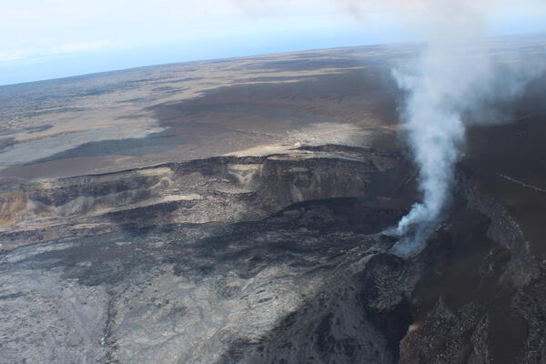Color photograph of degassing vent in crater