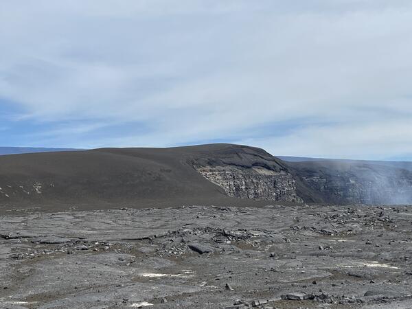 Color photograph of hills covered with small volcanic rocks