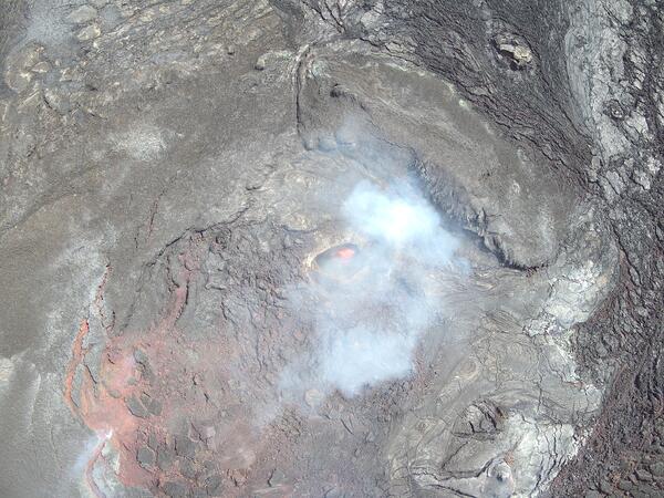 Color photograph of lava within volcanic vent