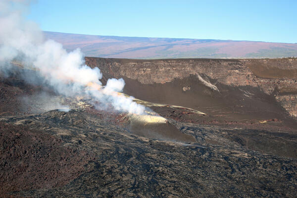 Color photograph of volcanic vent degassing