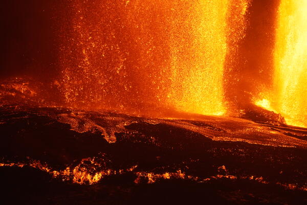 Color telephoto of lava flows at base of lava fountain
