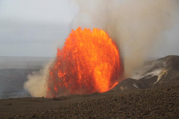 Color photograph of lava fountain during the daytime