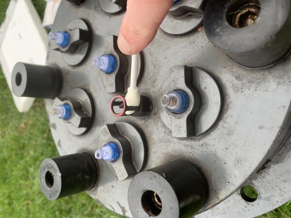 A close up of the Bacterial probes being cleaned before deployment