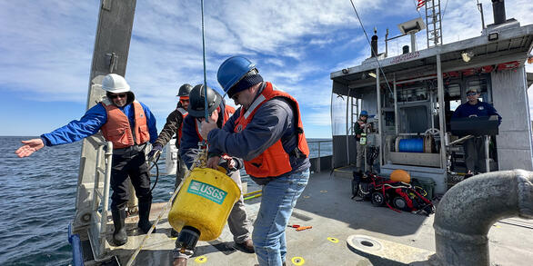 Researchers from the Woods Hole Coastal and Marine Science Center recover oceanographic instruments off Cape Cod.