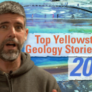 Thumbnail image of a man speaking in front of a photo of a colorful hot spring