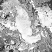 Black and white aerial view of a glacier.