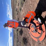 Two drone pilots set up equipment to be used in study near Moab, Utah