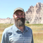 Portrait of Gregor Schuurman in Badlands National Park.