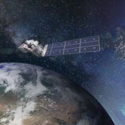 Landsat satellites from 1972 to present moving above the Earth. T