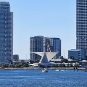 Milwaukee Harbor in foreground with Discovery World building and other tall buildings in background