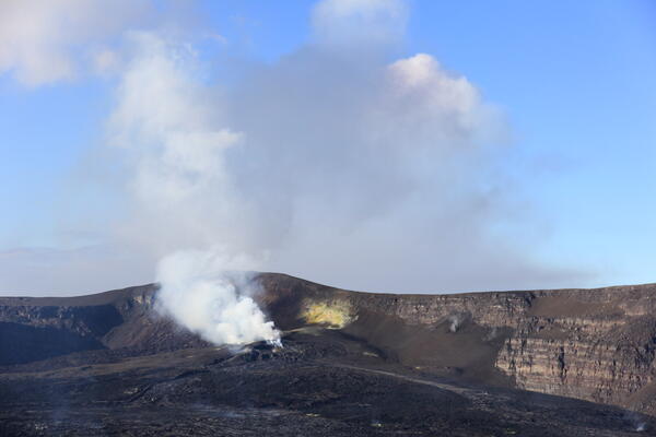 Color photograph of volcanic vents degassing