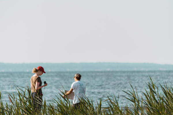 Two people on the shore of Lake Erie
