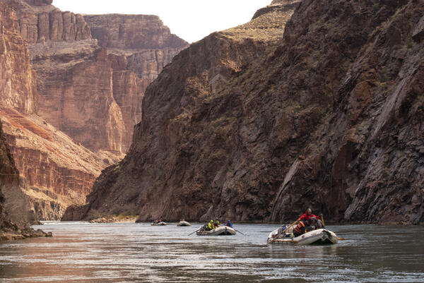 Research boats travel along the Colorado River in Grand Canyon
