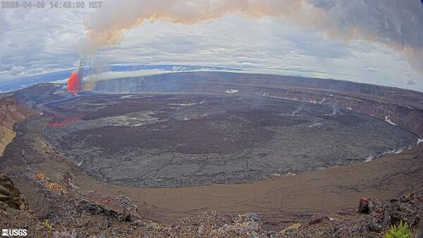 Color webcam image of volcanic eruption in crater