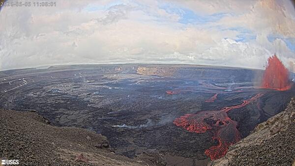 Color webcam image showing lava fountaining and lava flows within a volcanic crater