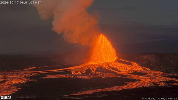 Color photograph of lava fountain and lava flows