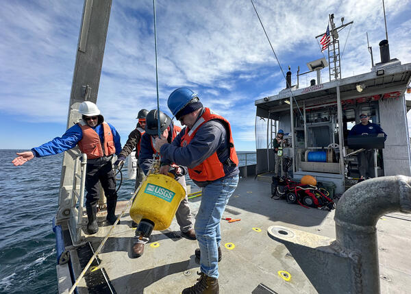 Researchers from the Woods Hole Coastal and Marine Science Center recover oceanographic instruments off Cape Cod.