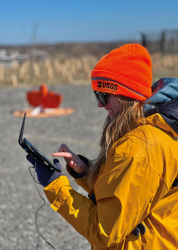 Researcher prepares a wingtra lidar flight at the Darby Creek landfill Superfund site 