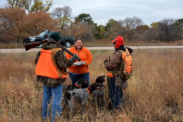 A pheasant hunter being interviewed