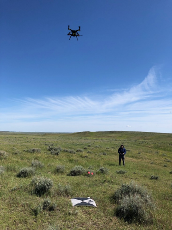 Drone hovering over flight operator 