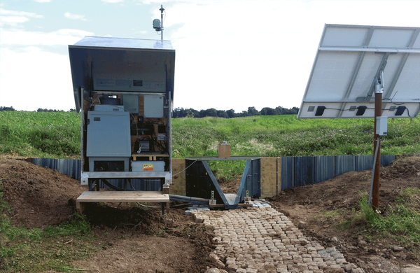 Photos of various edge-of-field monitoring sites, installation efforts, and runoff events across the Great Lakes basin.