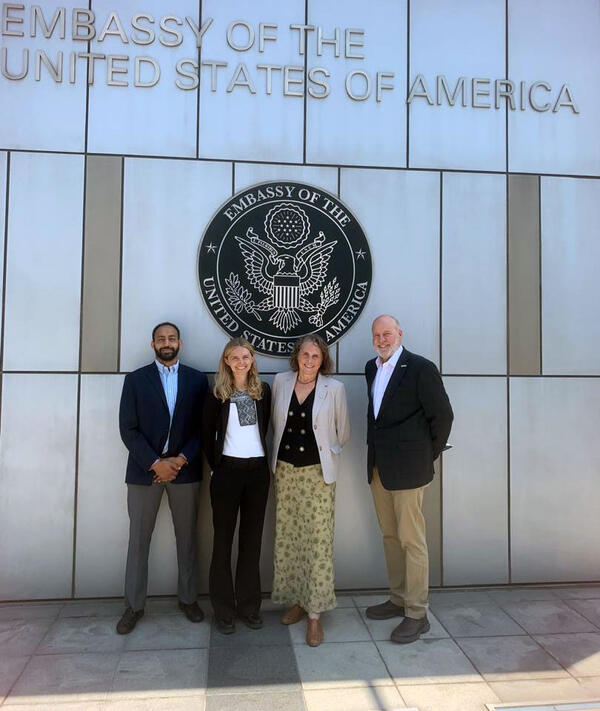USGS scientists stand outside of Embassy Bishkek, Kyrgyz Republic