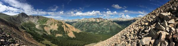View of mountains from rocky slope