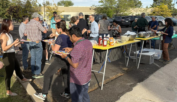This photo shows Flagstaff Science Campus employees with the Director's Office at the campus barbecue 