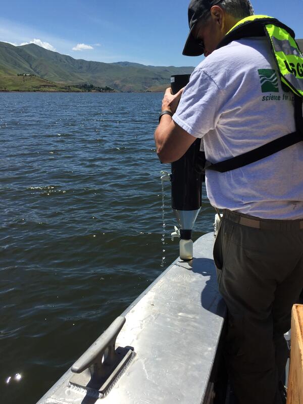 USGS scientists deploys sediment in a canyon reservoir
