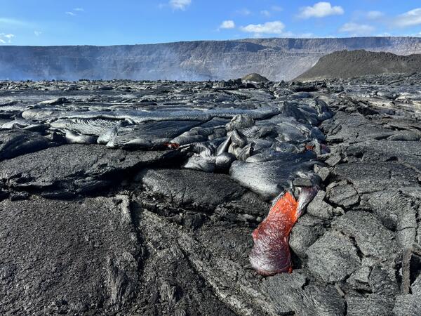 Color photograph of active lava flowing